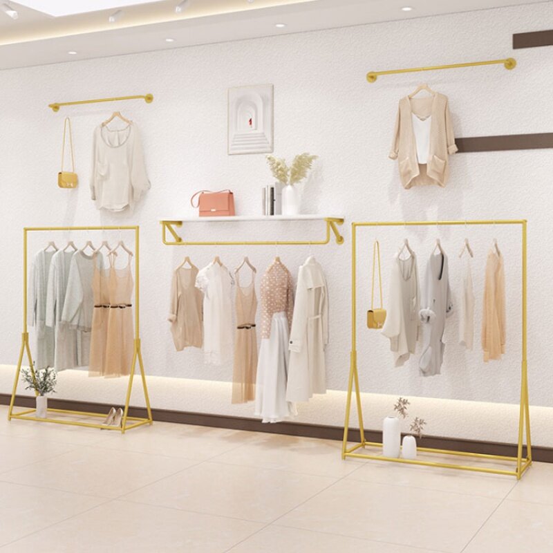 Soporte de exhibición de Ropa de Oro personalizado, estante colgante montado en la pared, accesorios de tienda de ropa, muebles