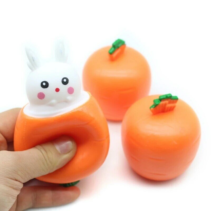 Juguete exprimible agitada del conejo que salta del mitigador del estrés zanahoria TPR para autismo