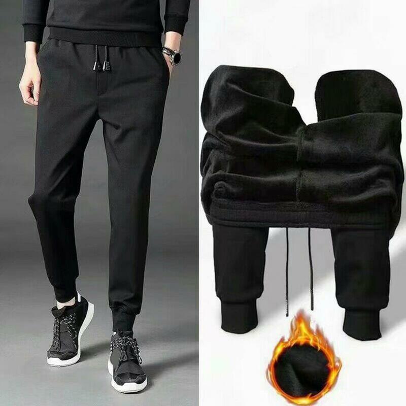 Celana Joger desain ergonomis pria, celana Joger pinggang elastis serut bulu hangat elastis untuk musim gugur/musim dingin