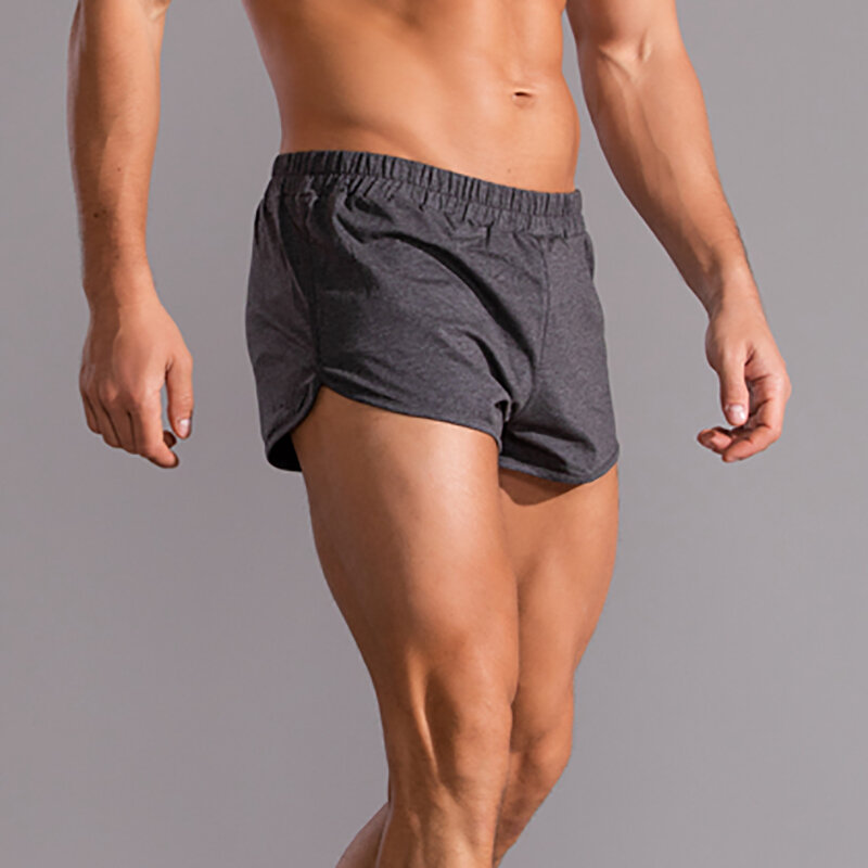 4XL ผู้ชายกางเกงผ้าคอตตอนใส่นอนกางเกงออกกำลังกายขาสั้นไร้รอยต่อเอวต่ำระบายอากาศดีกางเกงบ็อกเซอร์