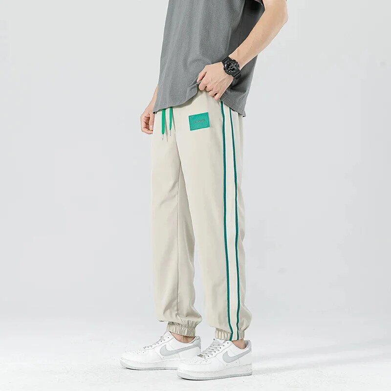 Pantalones de pierna ancha a rayas laterales para hombre, versión coreana, Hip-hop, holgados, informales, rectos, para deportes al aire libre, correr, 2024