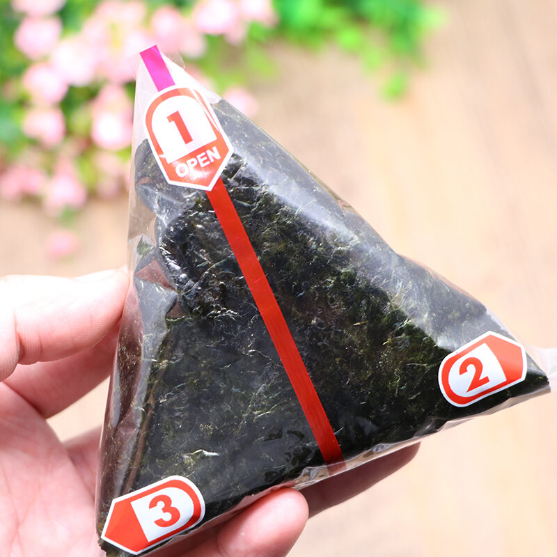 Bolsa de plástico para embalaje de bolas de arroz triangulares, 100 piezas, Nori, algas marinas, Onigiri, Sushi, accesorios Bento portátiles de fácil desgarro