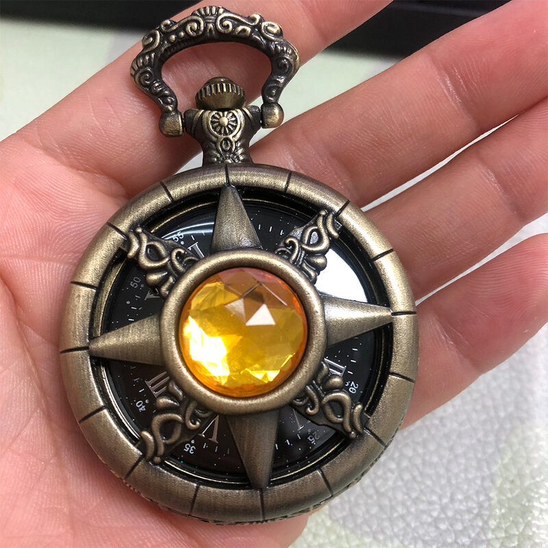 Reloj Retro de bronce con diseño de timón hueco, reloj de bolsillo de cuarzo con piedra Esmeralda incrustada de diamante amarillo a la moda, esfera de cielo estrellado