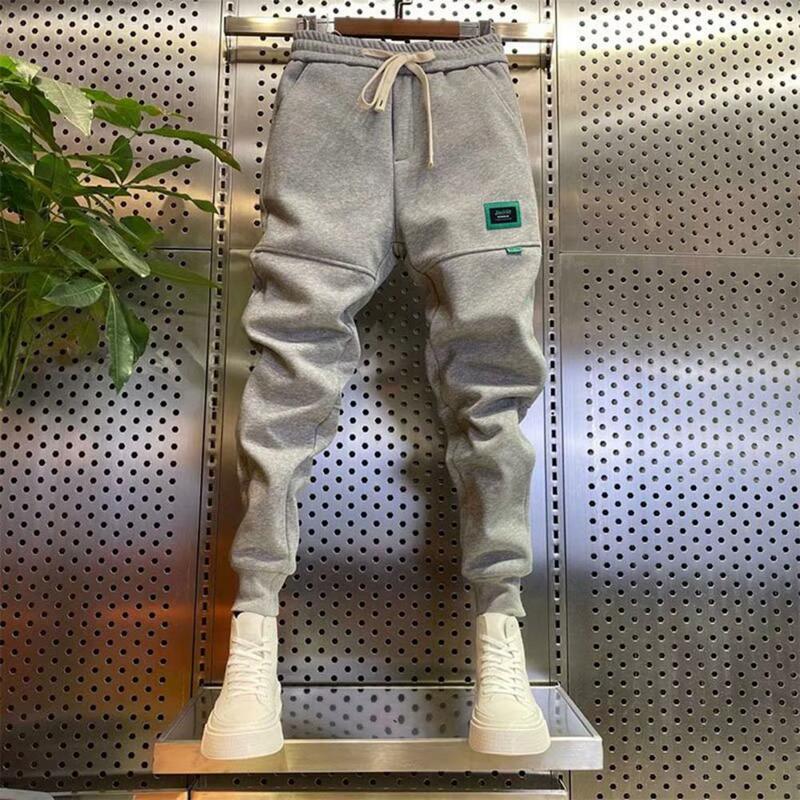 Harajuku pantaloni sportivi con fascia alla caviglia in peluche spessi pantaloni sportivi Hip Hop pantaloni Harem Casual maschili pantaloni Cargo da uomo Streetwear