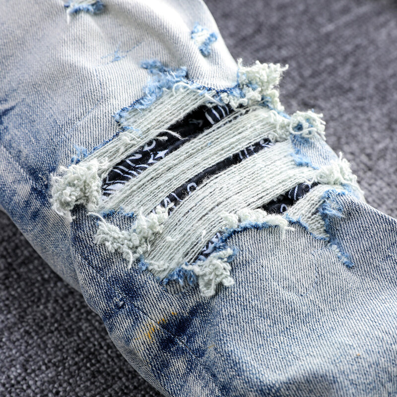 Pantalones vaqueros rasgados elásticos para Hombre, Jeans Retro lavados de color azul, diseño parcheado, marca Hip Hop, moda urbana