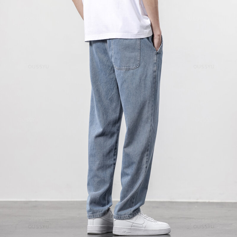 Wiosenne letnie męskie dżinsy bawełniane miękkie sznurkiem proste spodnie w pasie Vintage Korea Casual spodnie męskie Plus rozmiar S-5XL