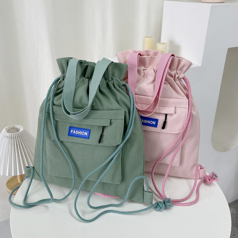 Borsa da donna personalizzata 2024 nuova borsa in tela con Bundle in tinta unita zaino portatile per aula per studenti d'arte personalizzato