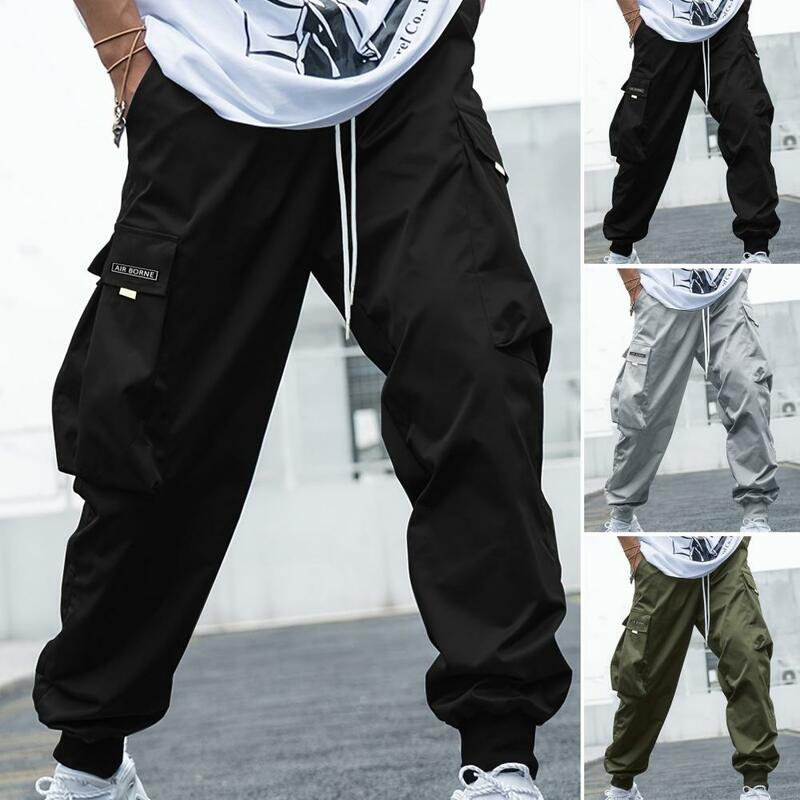 Брюки-карго мужские однотонные, стильные штаны с несколькими карманами, эластичная талия, на завязках, удобная уличная одежда