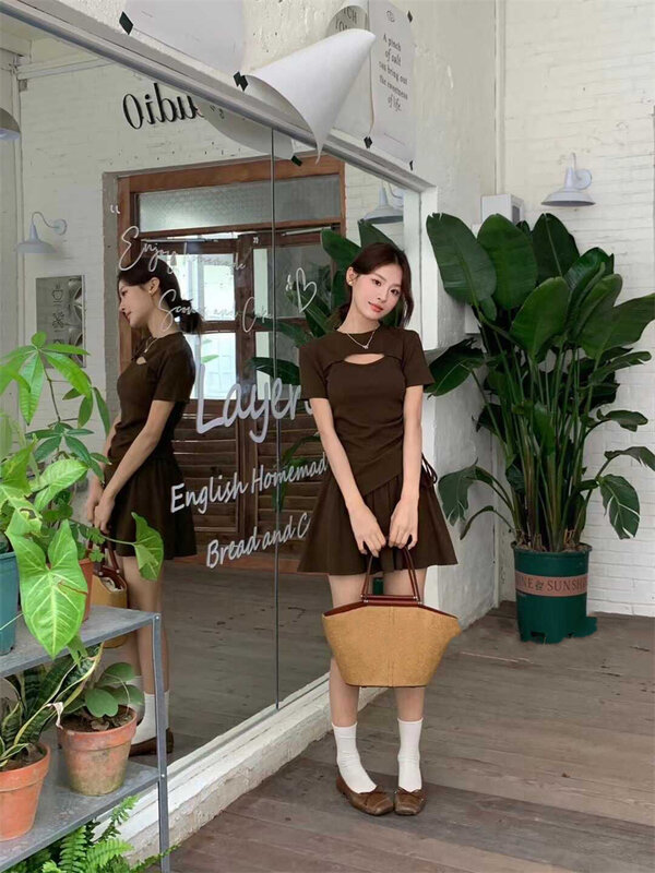 2024 Summer New Age Reduction Fashion Irregular Flesh Hollow-out T-shirt Top Set For Women + sports Skirt Two-piece Set Tide