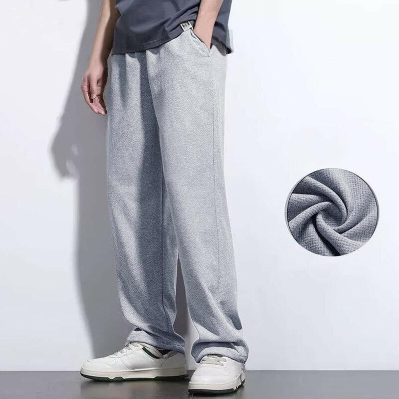 Pantalones holgados con bolsillo para hombre, pantalón informal de fondo recto con cordón, cintura elástica, Color sólido