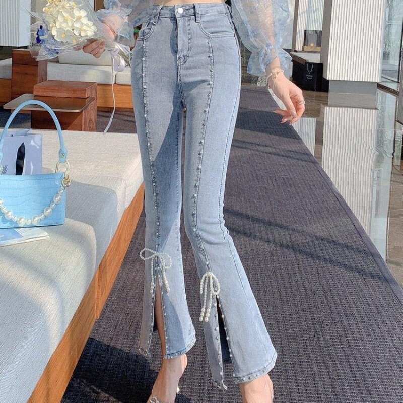 Primavera e autunno 2024 delle donne a vita alta nuovi Jeans svasati con borchie spaccate versatili in stile Lolita giapponese