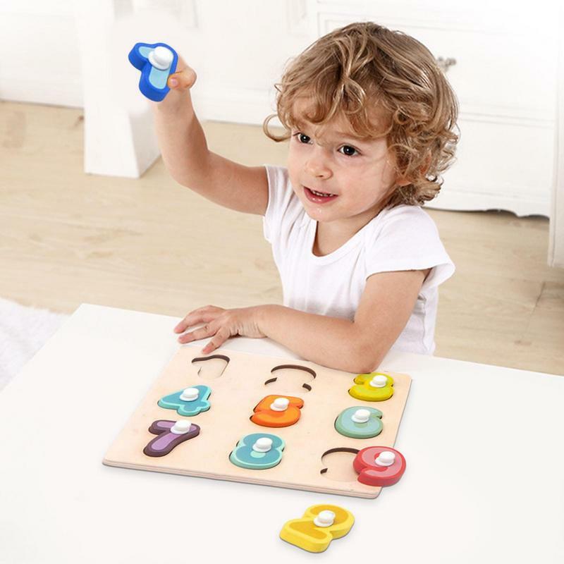 Bambini Montessori Puzzle in legno Hand Grab Board giocattoli educativi bambini Cartoon Number Letter Math Puzzle regali per bambini