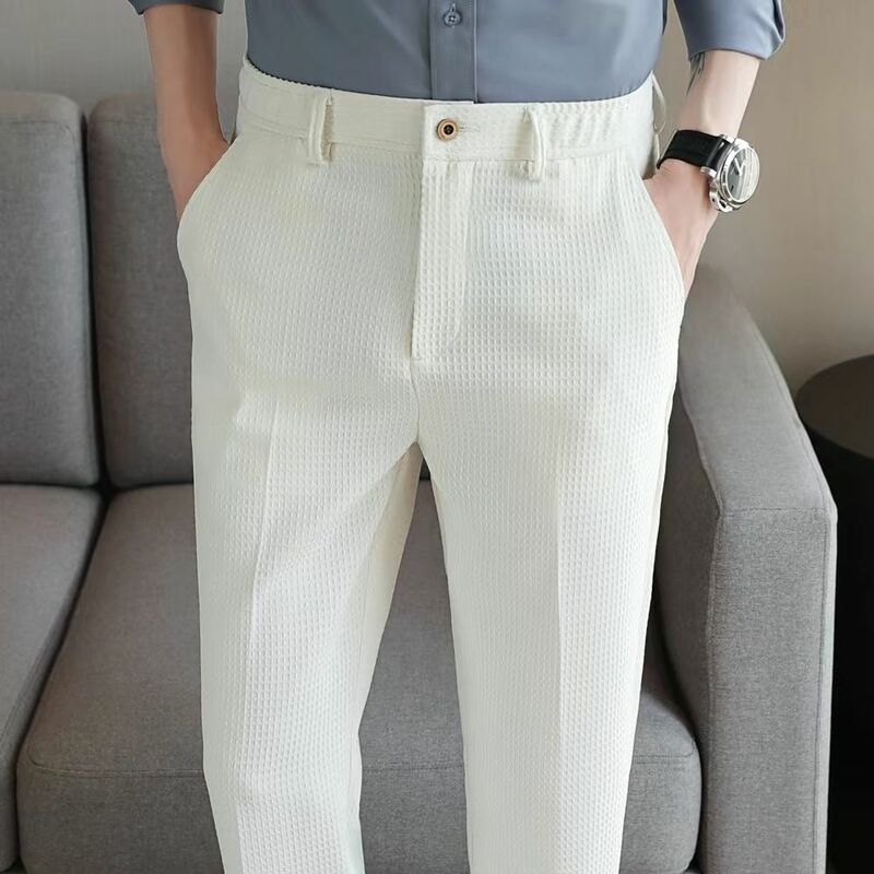 Pantaloni eleganti da uomo Casual tinta unita primavera estate slim Streetwear Fashion Waffle Business New Coffee pantaloni dritti kaki