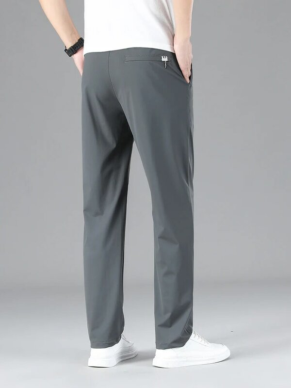 Odzież męska wysokiej jakości spodnie na co dzień letnie cienkie lodowy jedwab proste sznurkiem w pasie spodnie dresowe do biegania spodnie męskie