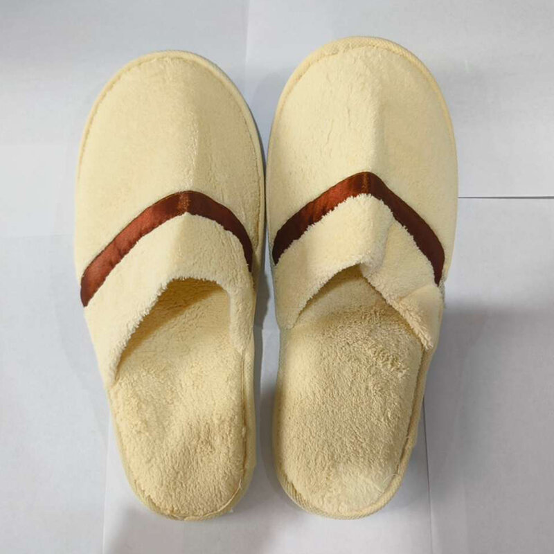 Zapatillas desechables de Interior para invitados de Hotel, pantuflas de Color sólido de alta calidad, Zapatillas de casa suaves de lana de Coral para hombres y mujeres