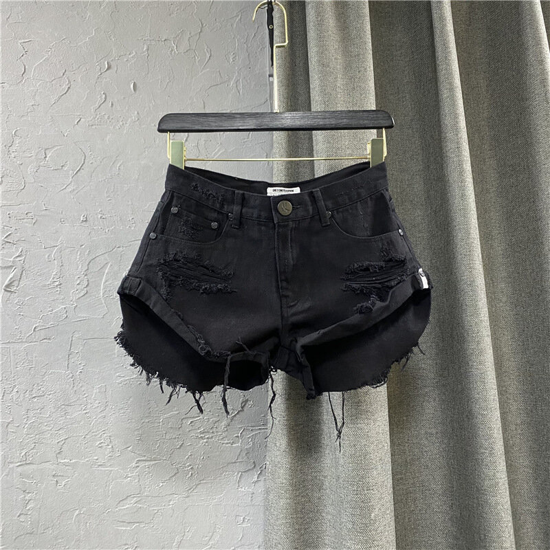 Sexy Denim Shorts Met Lage Taille 2024 Een Nieuw Zomergat. Een Broek Met Wijde Pijpen Gescheurde Jeans Voor Dames