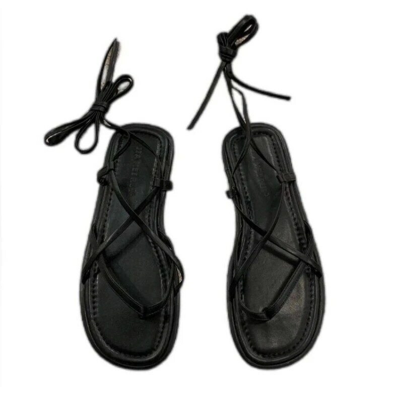 รองเท้าแตะสำหรับผู้หญิงรองเท้าส้นแบนลำลองสีพื้นสายไขว้แบบ Sandal jepit Fashion มาใหม่ล่าสุดฤดูร้อน2024