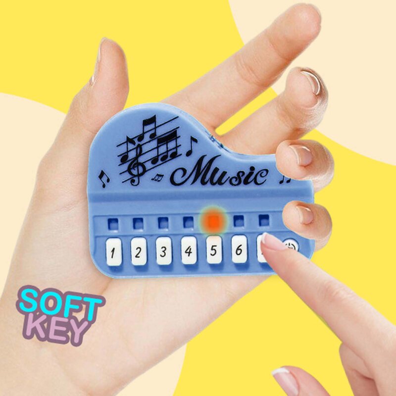 Chaveiro eletrônico do piano do dedo, brinquedo portátil do instrumento musical para a chave, decoração pendurada da trouxa, moda
