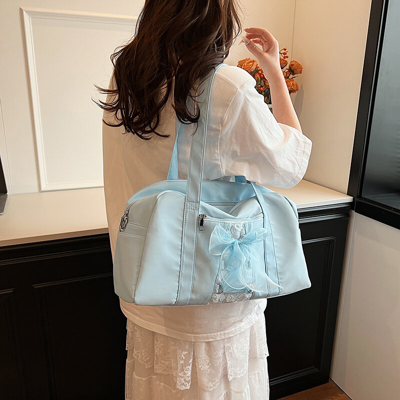 女性のためのキャンバスショルダーバッグ,小さな弓のデザインのバッグ,アンダーアームバッグ,ショッピングと旅行のためのショッピングバッグ,韓国のファッション,2024