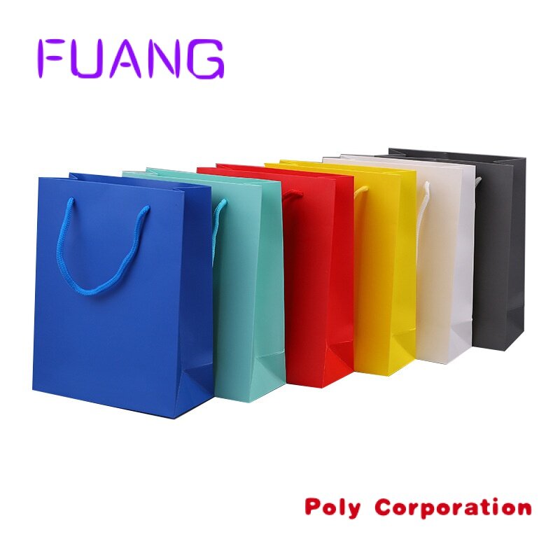 Bolsa de papel de embalaje de regalo con logotipo personalizado, bolsa de compras de cartón de Color sólido con asa de cuerda, fabricantes