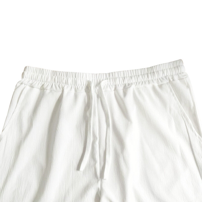 Męskie spodnie bawełniane lniane spodnie na co dzień luźne proste spodnie lekkie sznurkiem wakacje na plaży oddychające luźne spodnie dresowe