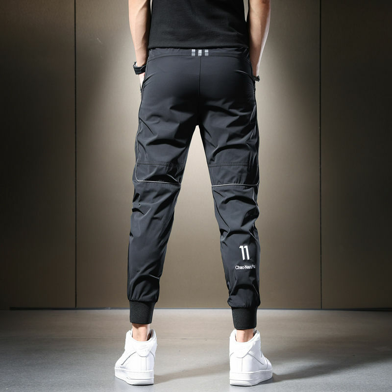 Letnie 2023 codzienne męskie spodnie czarne szare spodnie ze sznurkiem lekkie oddychające szybkoschnący lodowy jedwab odzieży sportowej