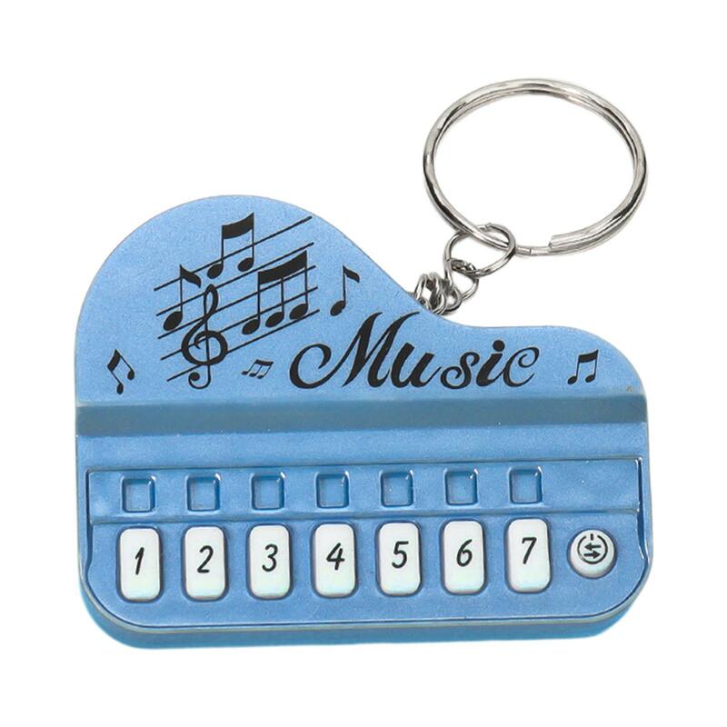 พวงกุญแจเปียโนขนาดมินิเพื่อการศึกษาพวงกุญแจเปียโนนิ้วมือสำหรับวัยรุ่นผู้ใหญ่ครูสอนเปียโนคนรักดนตรี