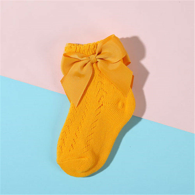 女の子用の大きなリボン付きの通気性のあるコットンソックス,0〜5歳の女の子用の短い透かし彫りの靴下
