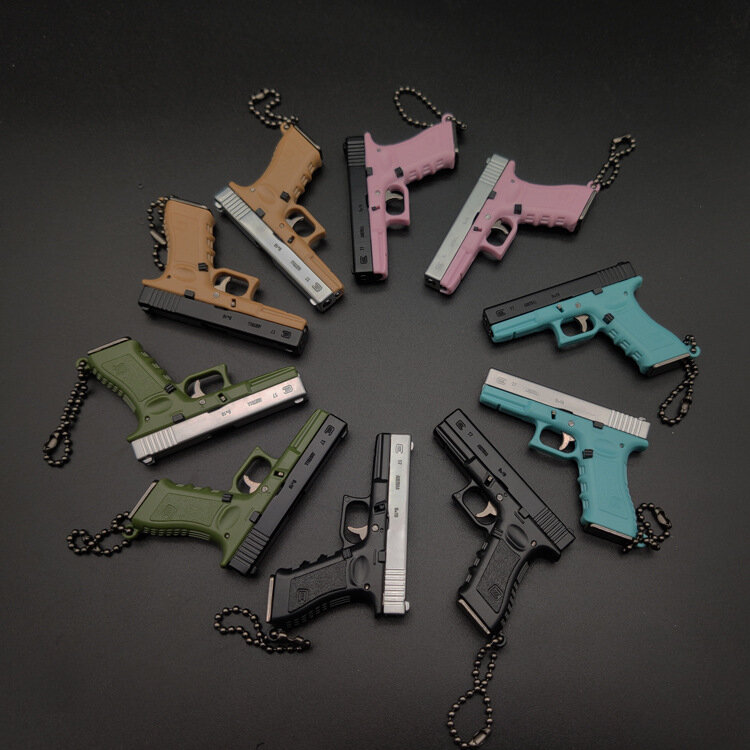 (Sem balas) 1:3 glock g17 liga chaveiro de plástico mini arma de brinquedo modelo presente pingente ornamento fidget descompressão brinquedo anti-stress