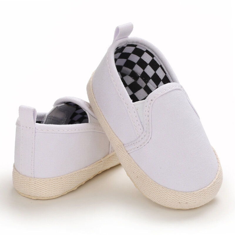 Scarpe da passeggio piatte da ragazzo e da ragazza di moda classica scarpe antiscivolo in tela per neonati le prime scarpe da passeggio Walker