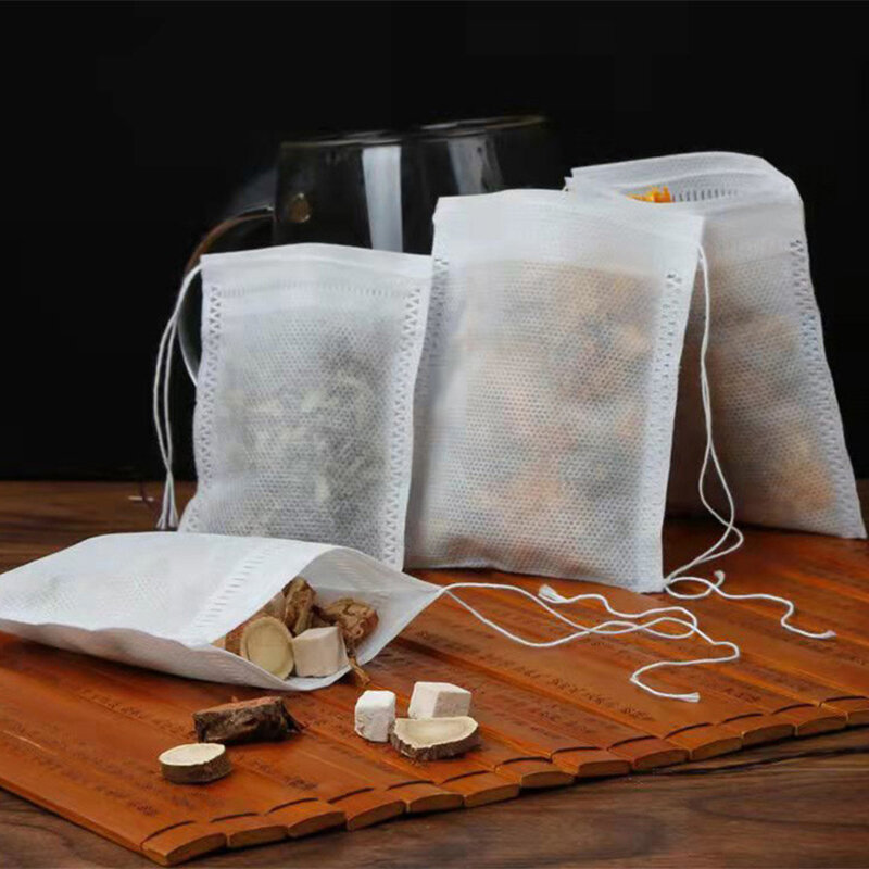 Bolsas de filtro de té desechables para café, Infusor de té, tela no tejida, filtros de especias, sello con cordón, bolsitas vacías, 50 piezas