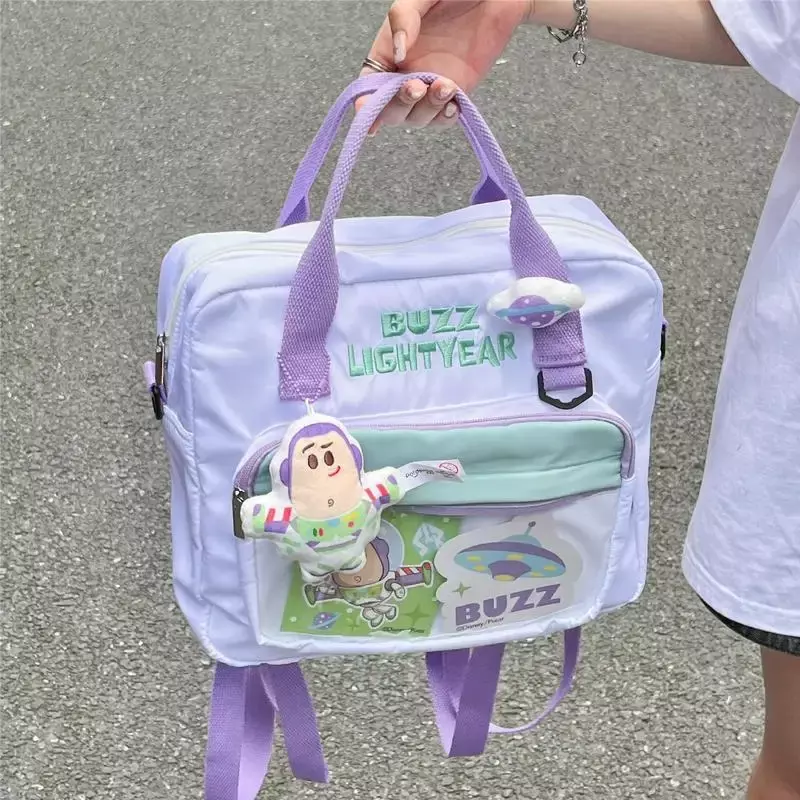 กระเป๋าคาดลำตัว Disney Buzz Lightyear การ์ตูนอะนิเมะผ้าใบความจุขนาดใหญ่ลำลองน่ารักกระเป๋าหิ้วกระเป๋าสะพายไหล่สำหรับสตรี