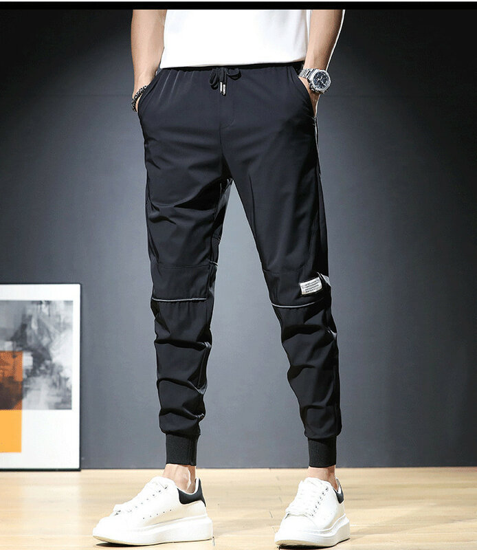 Męskie spodnie w stylu Harajuku z elastyczną talią w stylu Casual wiosna lato spodnie sportowe zwężane nogawki idealne codzienne noszenie spodnie do ćwiczeń