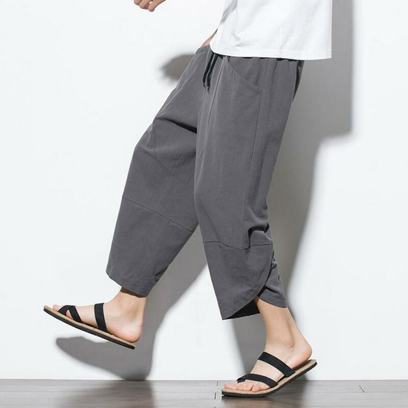 Celana kaki lebar pria, bawahan olahraga Linen katun Harajuku longgar musim panas, celana Harem panjang betis tidak beraturan