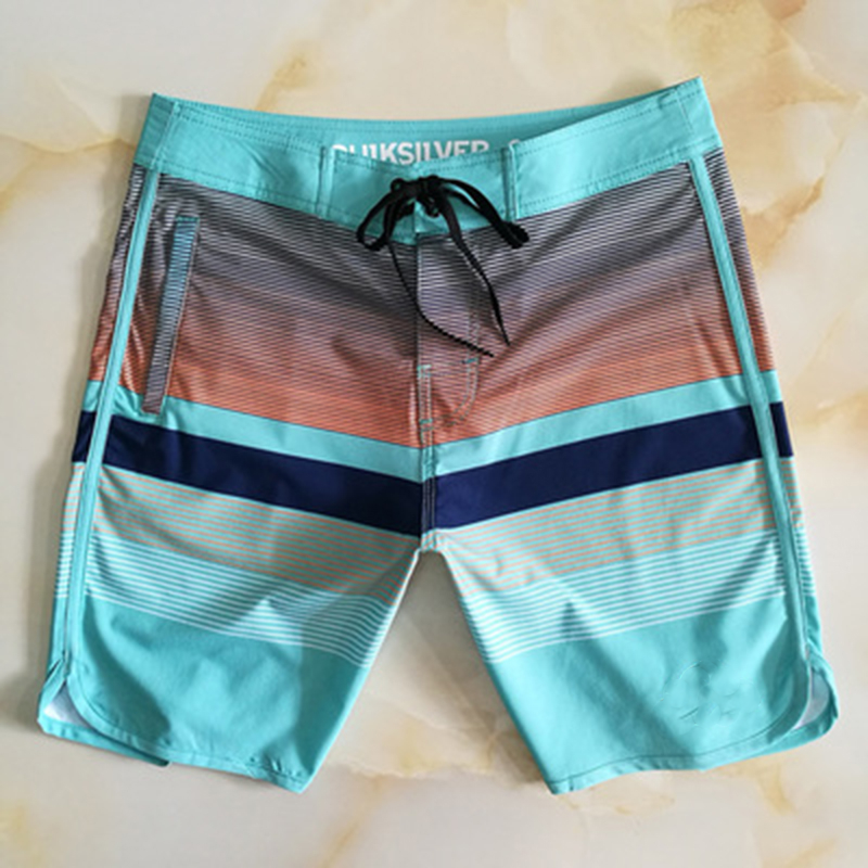 Clássico dos homens 4-way elasticidade boardshorts novas calças de praia bermuda shorts de surf de secagem rápida à prova d 'água marca calções de surf de praia