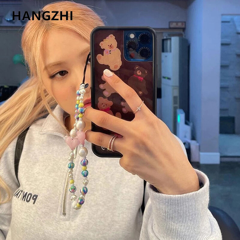 جديد الكورية المعبود موضة اللؤلؤ شريط لتعليق الهاتف المحمول غير النظامية اللؤلؤ الملونة كرات الوردي القلب المحمول الحبل ل جراب هاتف HangZhi 2021