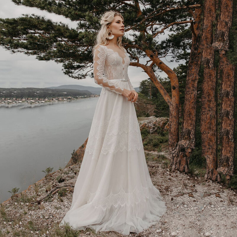 Vestido de noiva sexy estilo boêmio, mangas compridas, transparente, com decote, apliques, cinto de laço, tule