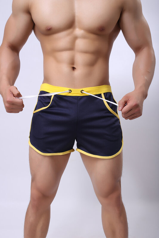 Gorąca sprzedaż męskie letnie cztery kolory przyczynowe sportowe szorty na siłownię bieganie oddychające kąpielówki plażowe krótkie kieszenie styl męski