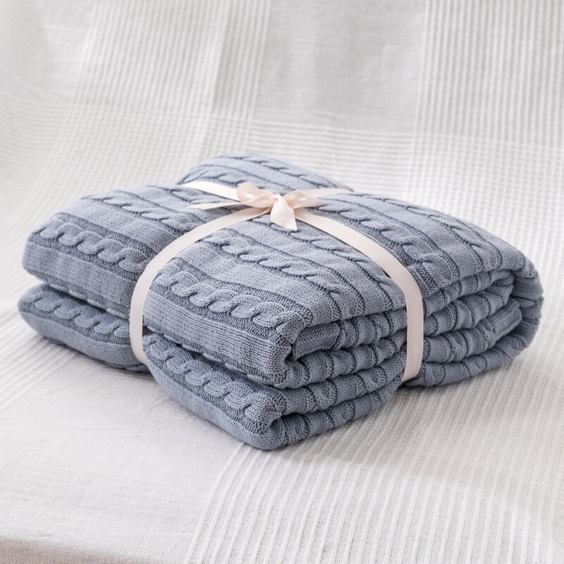 Couverture tricotée en fil sur le lit ou le canapé, serviette douce pour la sieste, le bureau, la maison