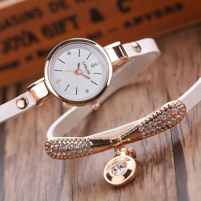 Reloj con correa de Metal para mujer, pulsera de cuarzo, a la moda, XQ