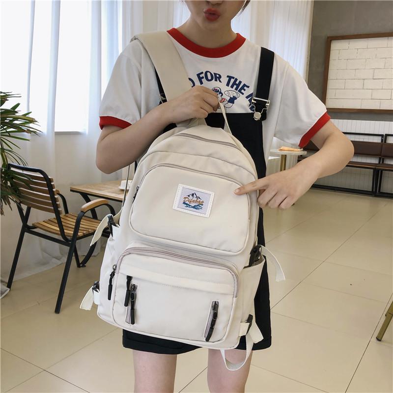 Moda à prova dwaterproof água náilon mochila feminina estudante saco de livro novo zíper mochilas escolares para adolescente gilrs