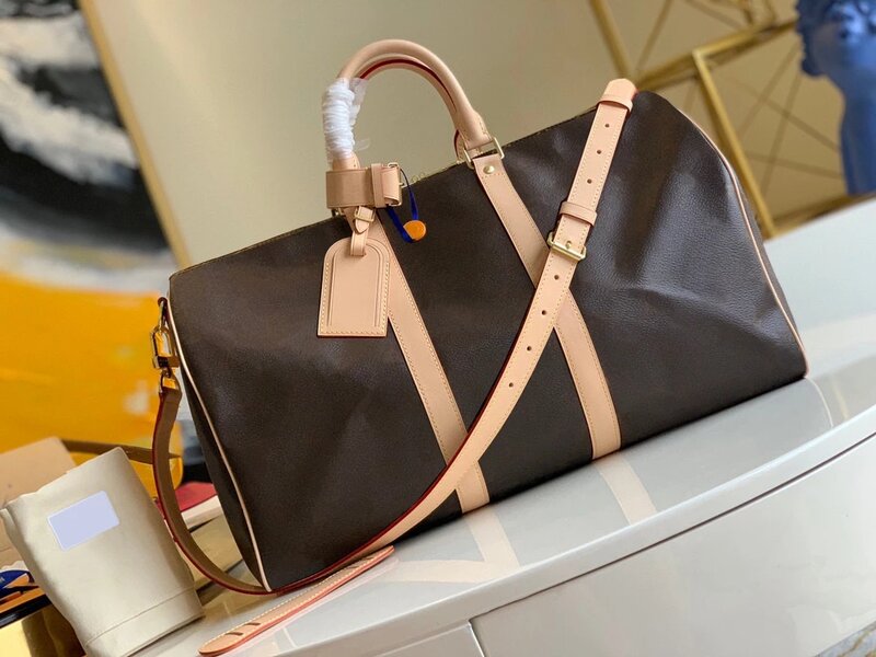 حار بيع 2021 كلاسيكي فاخر تصميم المرأة K11PA1 عطلة/الأعمال حقيبة سفر موضة جديدة عالية السعة حقيبة يد حقيبة ساع