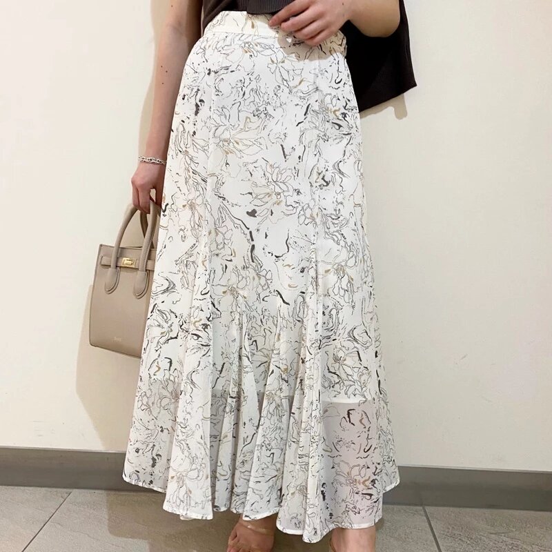 Chic alto Irregular cintura cadera Mujer Faldas temperamento elegante impresión falda trompeta Verano de 2021 drapeados de moda diseño Jupe