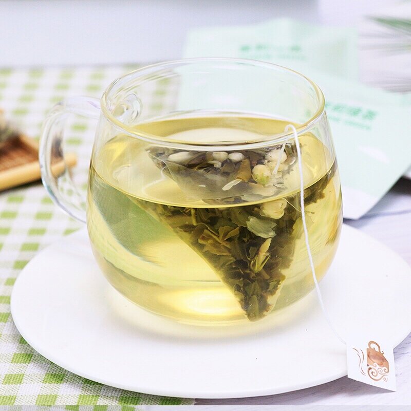 الشاي الصيني الأخضر مع جودة عالية الياسمين في أكياس trehugol 15 قطعة. 2 غرام لكل منهما. قسيمة 550 rub. من 2 قطعة