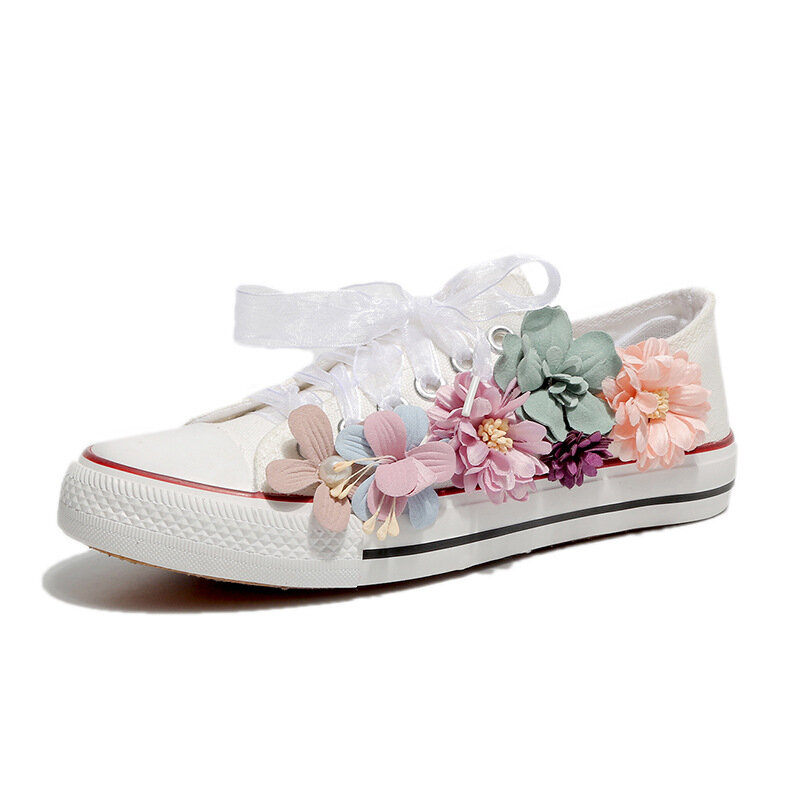 Sepatu Wanita Baru Musim Semi dan Gugur 2021 Sepatu Kanvas Kasual Modis Bunga Sepatu Putih Bertali untuk Siswa Hak Datar
