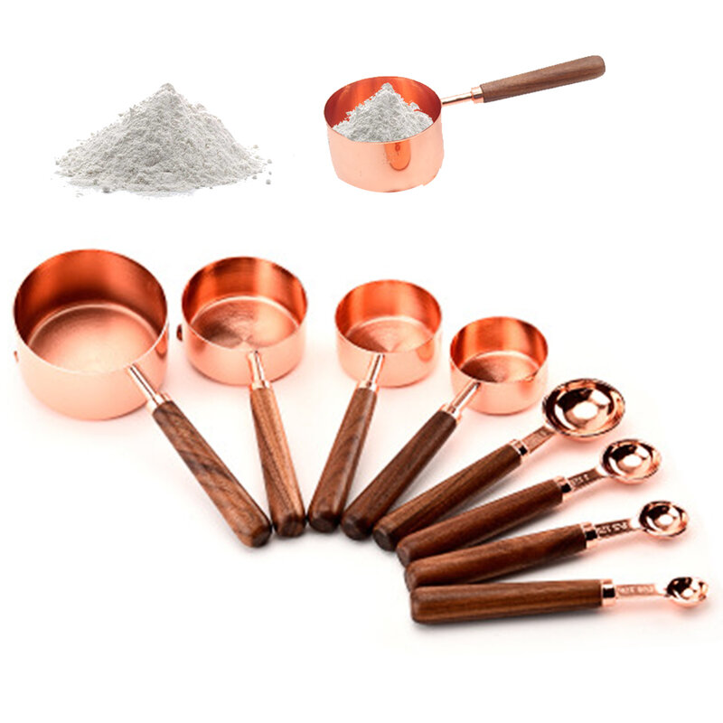 8Pcs Set di misurini e cucchiai in oro rosa Set in acciaio inossidabile impilabile con manici in legno di noce per la cottura in cucina 