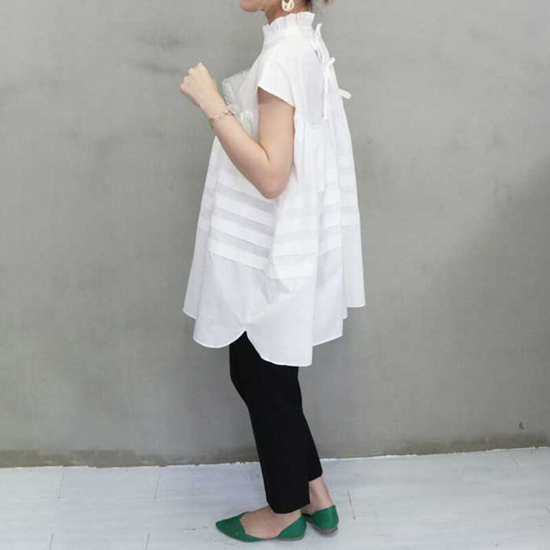 Camiseta Vintage para mujer joven, blusa blanca y negra, blusa elegante con cuello levantado, Tops de gran tamaño, Camiseta larga informal con lazo en la espalda, ropa para primavera