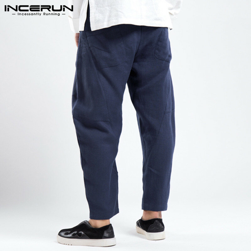 INCERUN Vintage spodnie z elastyczną gumką w pasie Streetwear męskie spodnie dresowe jednokolorowe luźne spodnie luźne oddychające bawełniane spodnie