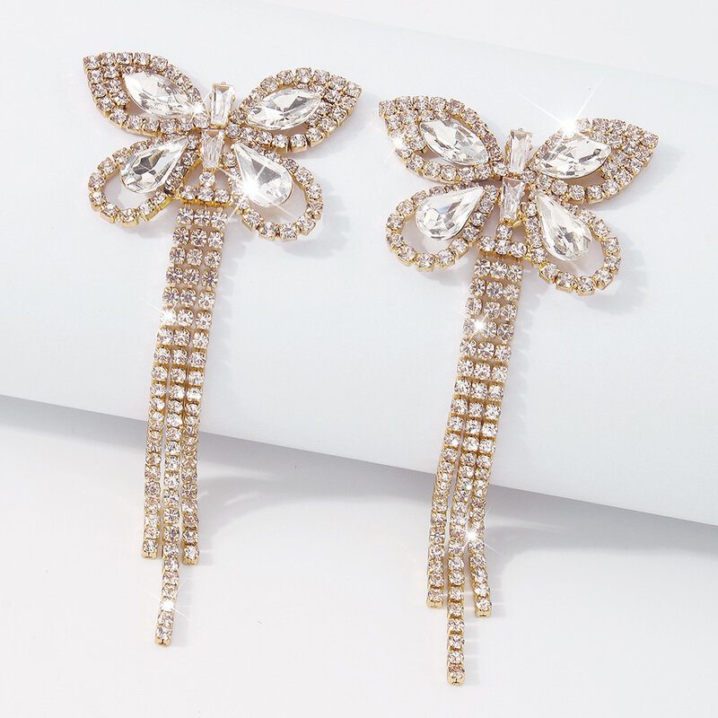 Boucles d'oreilles pour femmes, bijoux à chaîne à griffes de luxe, en diamant, papillon, pompon, Design assorti, 2021