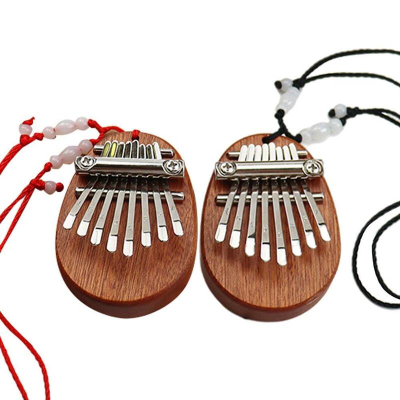 Mini Piano à pouce Kalimba avec lanière, 8 touches, Portable, pendentif Musical Marimba, cadeau, instrument de musique
